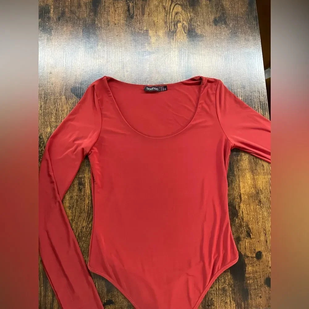 Boohoo Silky orange long sleeve bodysuit
Size 4 - Picture 2 of 8